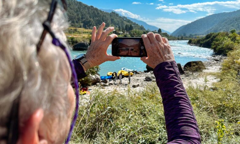 Taking a photo on a river trip