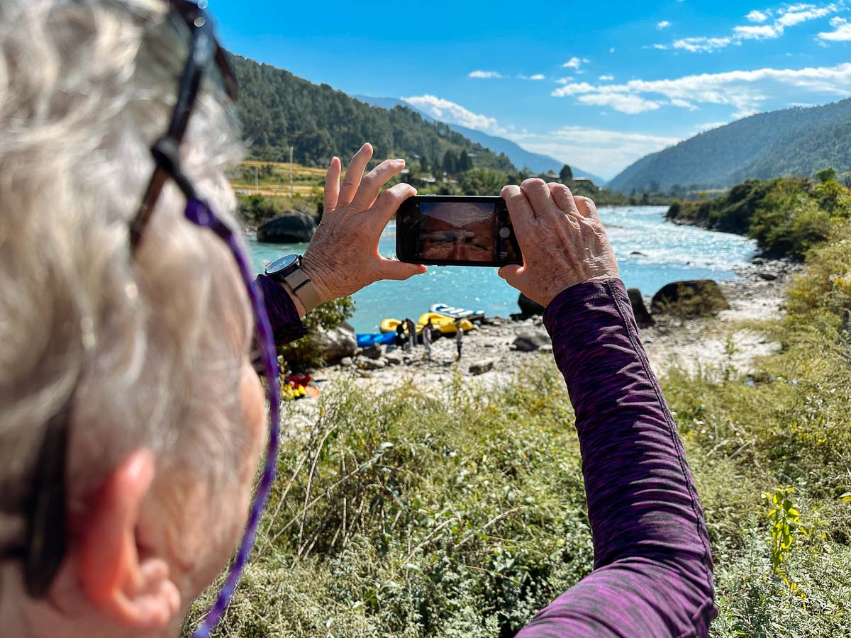 Taking a photo on a river trip